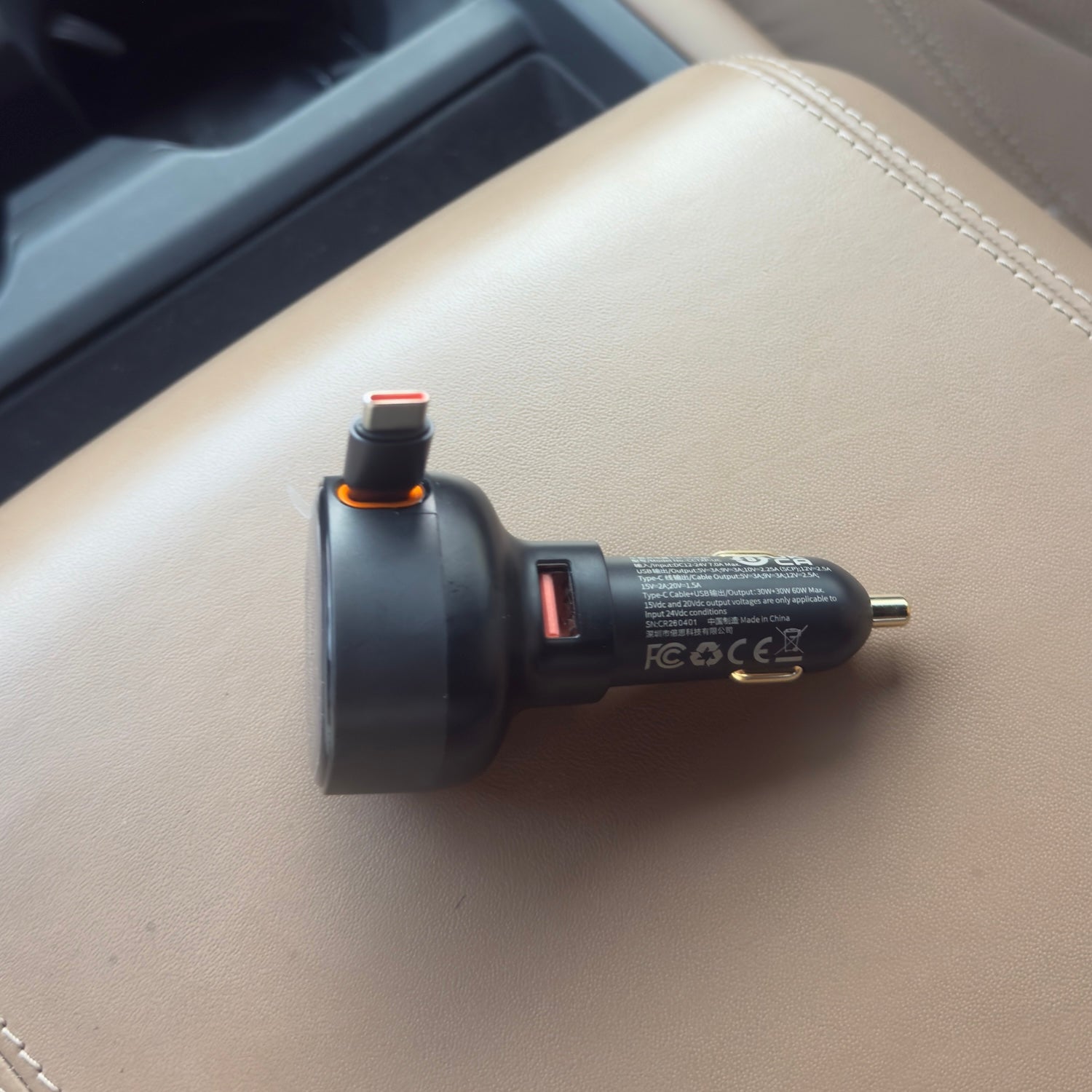 Fast car charger with built-in USB-C cable and USB port